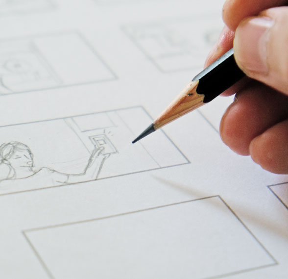 A story board artist drawing a scene