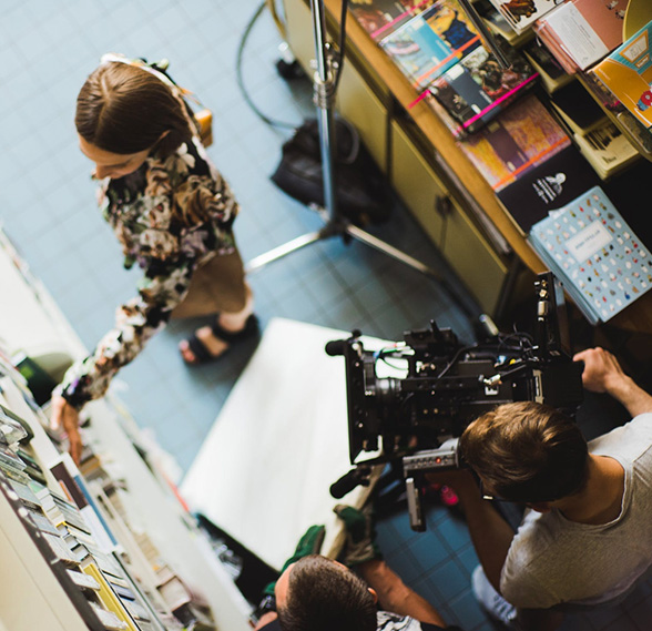 Filming crew in library