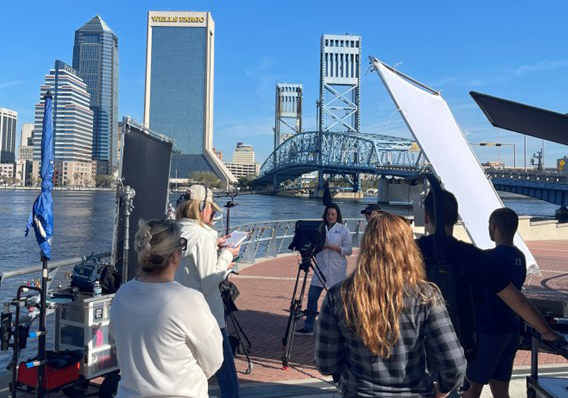 People Filming in Jacksonville Florida at the Friendship Fountain